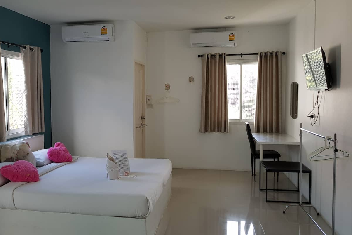 Family Room | Escritorio, cortinas blackout y wifi gratis