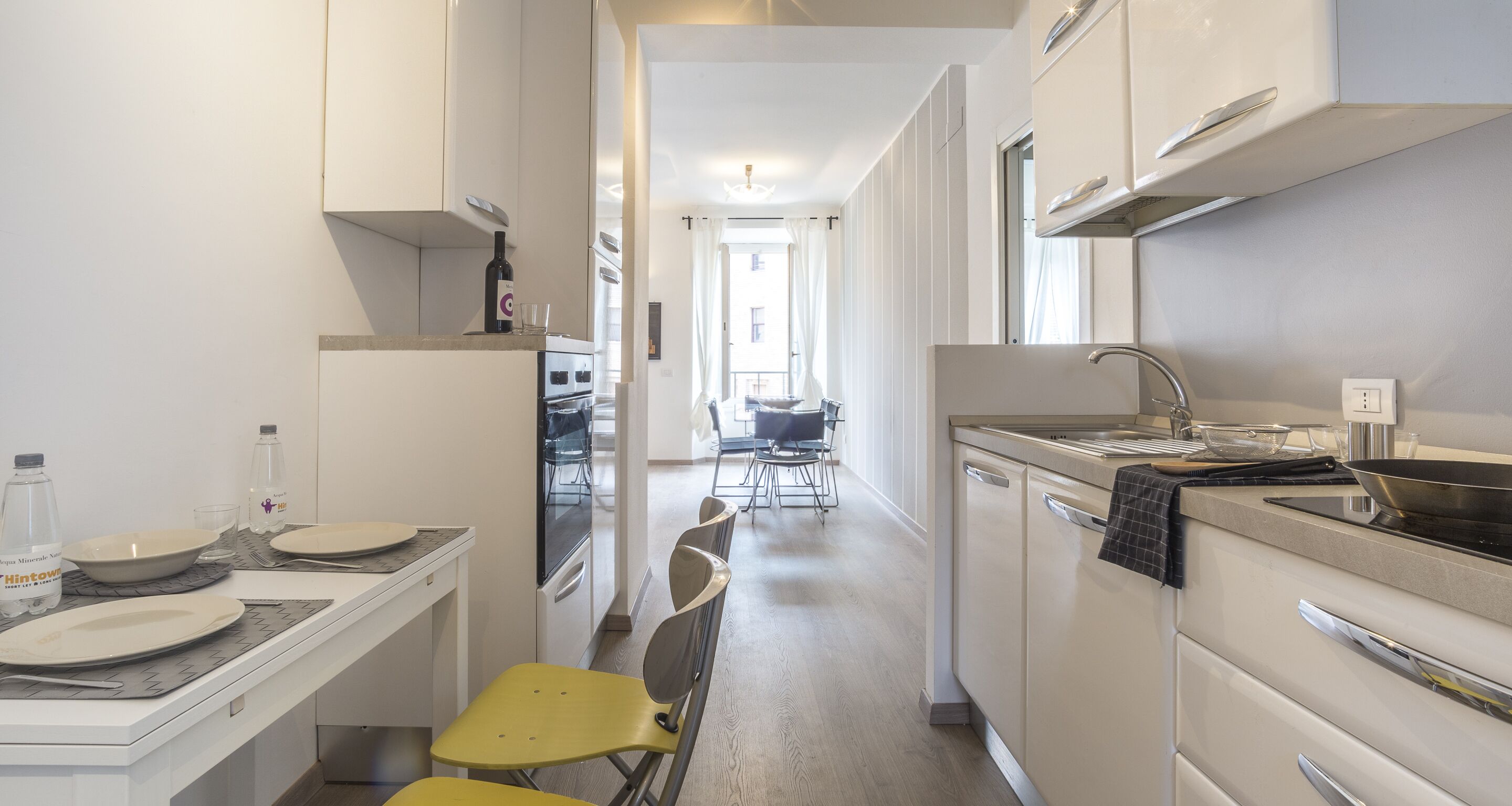 Apartamento, 2 quartos, vista para a cidade (Duomo Attic) | Cozinha privada | Geladeira, micro-ondas, fogão, cooktop