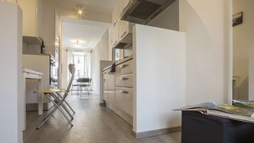 Appartamento, 2 camere da letto, vista città (Duomo Attic) | Cucina privata | Frigorifero, microonde, forno, piano cottura