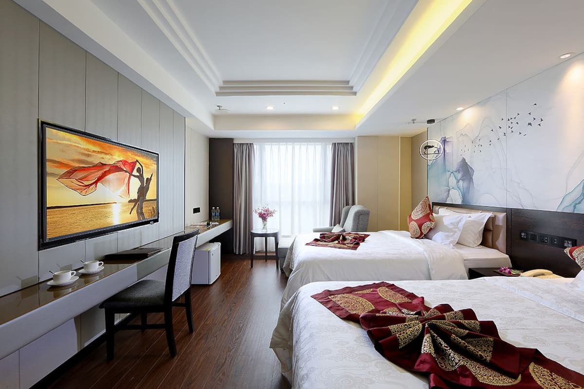 deluxe room | in-room safe, desk, blackout curtains, rollaway beds