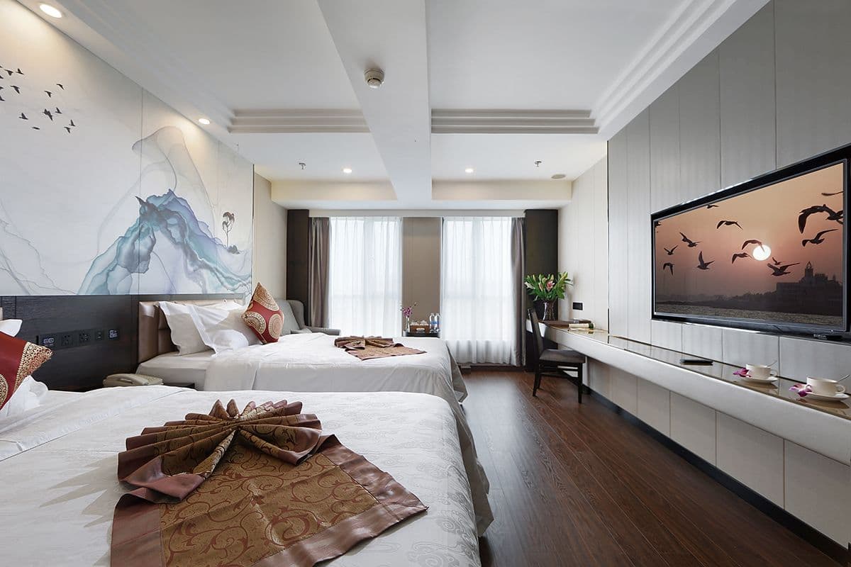 deluxe room | in-room safe, desk, blackout curtains, rollaway beds