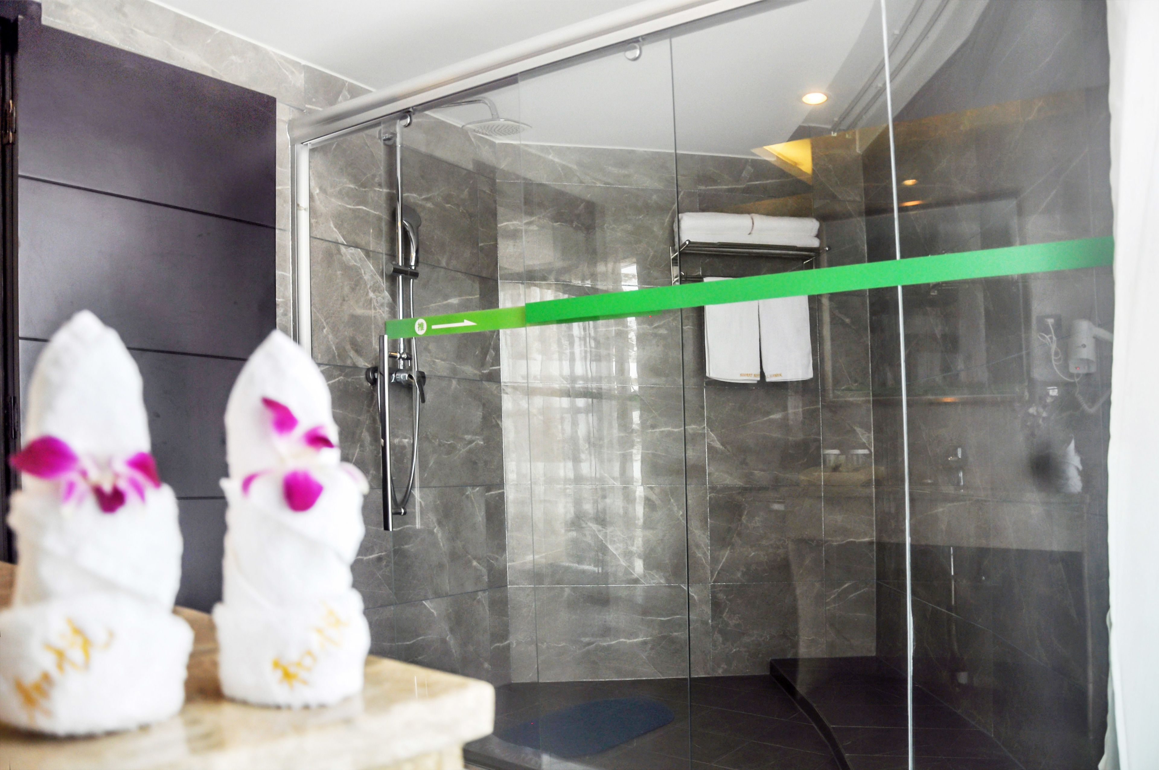 business suite | bathroom | shower, free toiletries, hair dryer, slippers