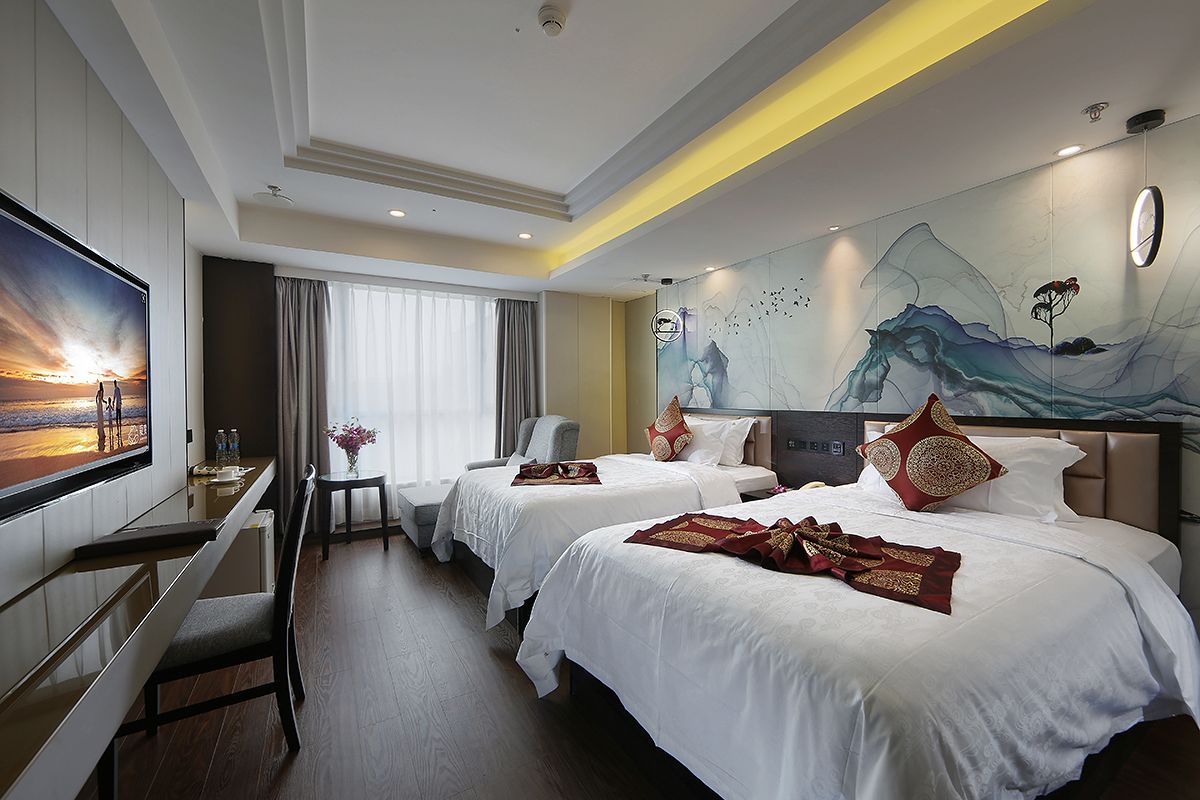 deluxe room | in-room safe, desk, blackout curtains, rollaway beds