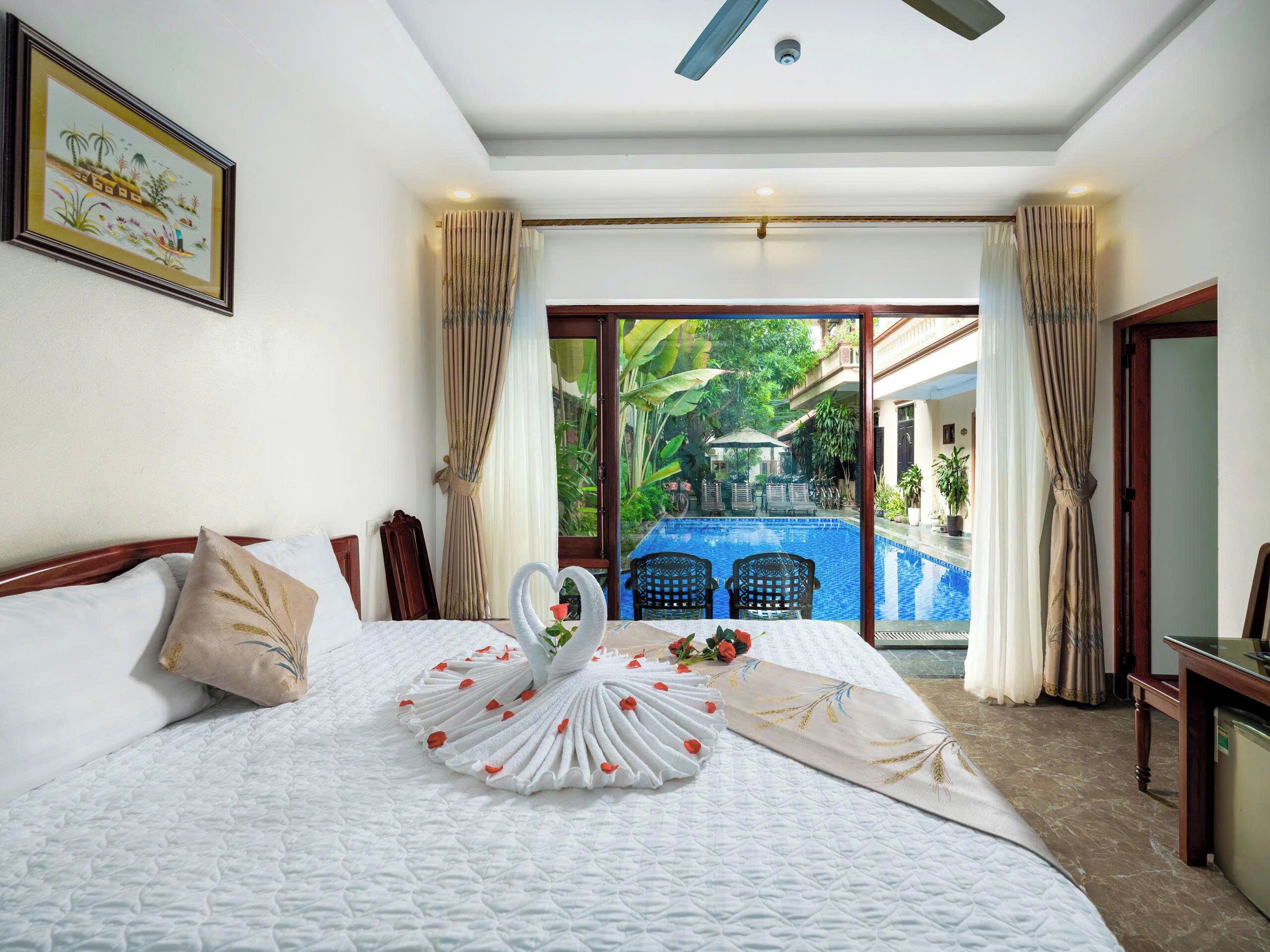 Deluxe Double Room, Pool View | Egyptian cotton sheets, premium bedding, memory foam beds, minibar