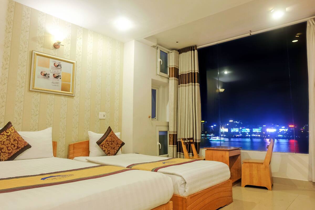Superior Triple Room, River View | Minibar, desk, WiFi (free)