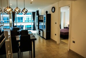One Bedroom Aprartment  | Living room | 42-inch flat-screen TV with cable channels, TV - Centara Avenue Residence by Towers (Pattaya)