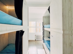 Dormitório compartilhado, em dormitório misto, banheiro privativo (1 bed in 4 beds dorm) | Wi-Fi de cortesia, roupa de cama