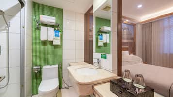 Shower, free toiletries, hair dryer, slippers