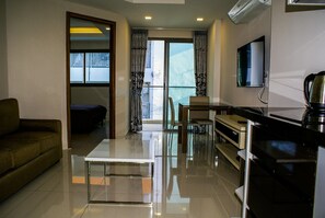 1-Bedroom Apartment | Living area | Flat-screen TV - New Nordic C-view Boutique (Pattaya)