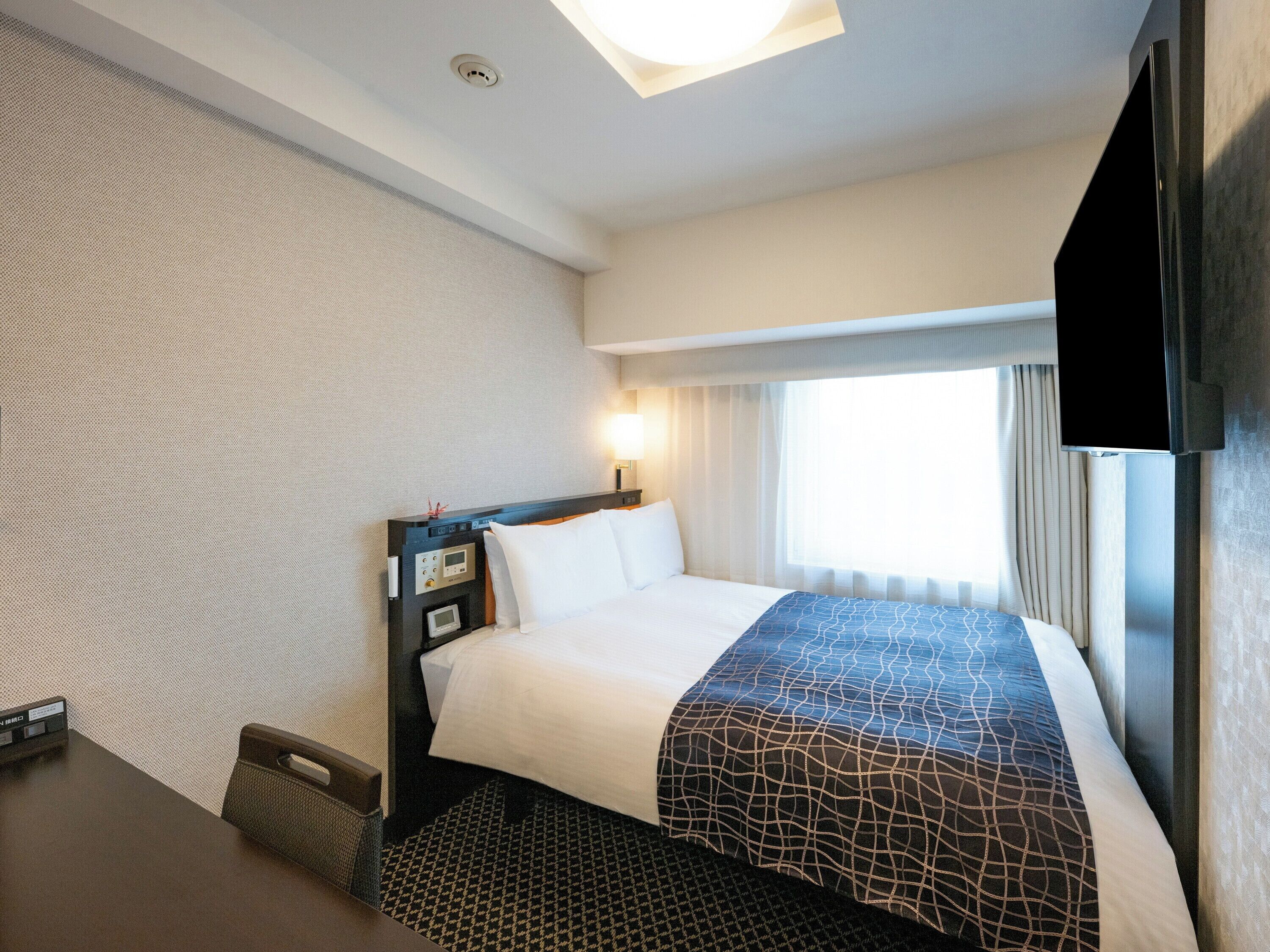 Down comforters, desk, blackout drapes, free WiFi