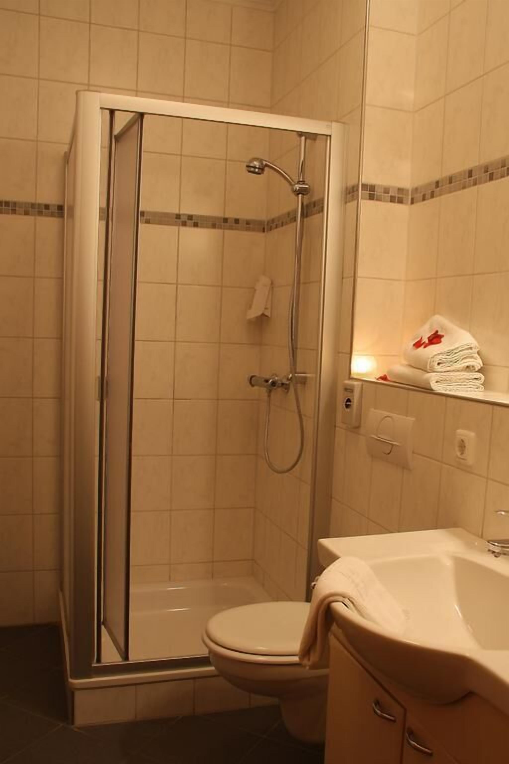 shower, free toiletries, hair dryer, towels