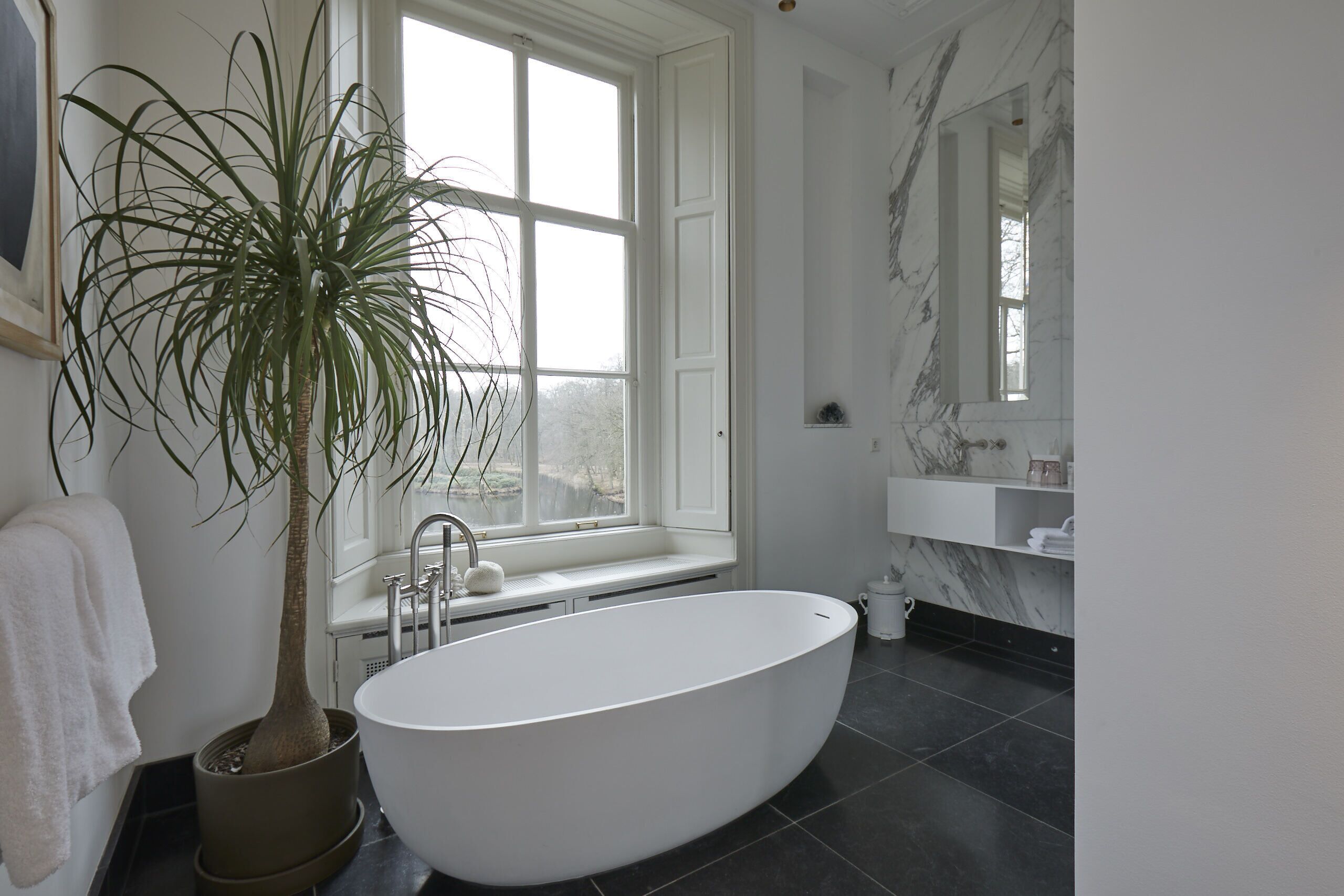 terrace suite | bathroom | rainfall showerhead, designer toiletries, hair dryer, bathrobes