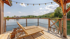 Superior huisje (Cabane sur l’eau avec Spa) | Terras