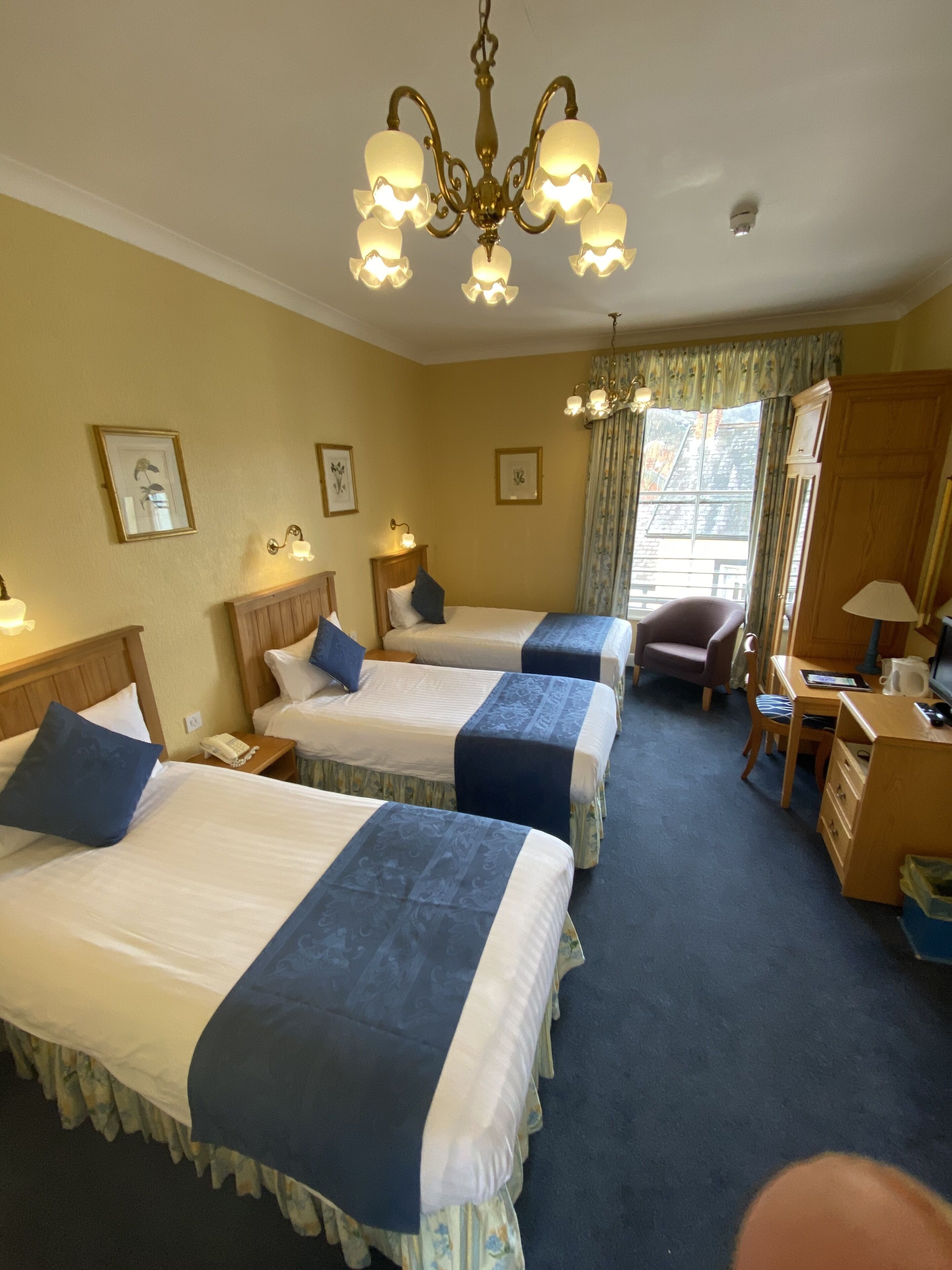 family room | 1 bedroom, desk, iron/ironing board