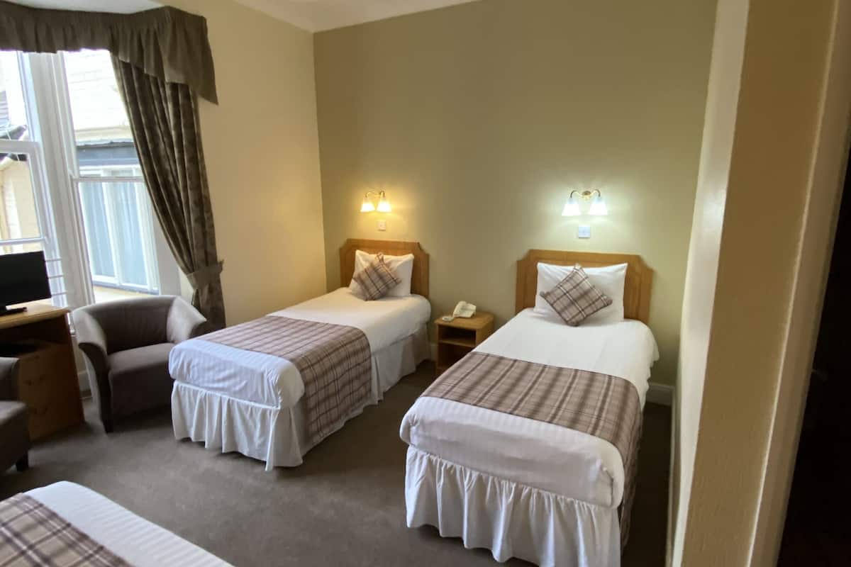 family room | 1 bedroom, desk, iron/ironing board