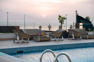 Outdoor pool, open 9:00 AM to 9:00 PM, sun loungers