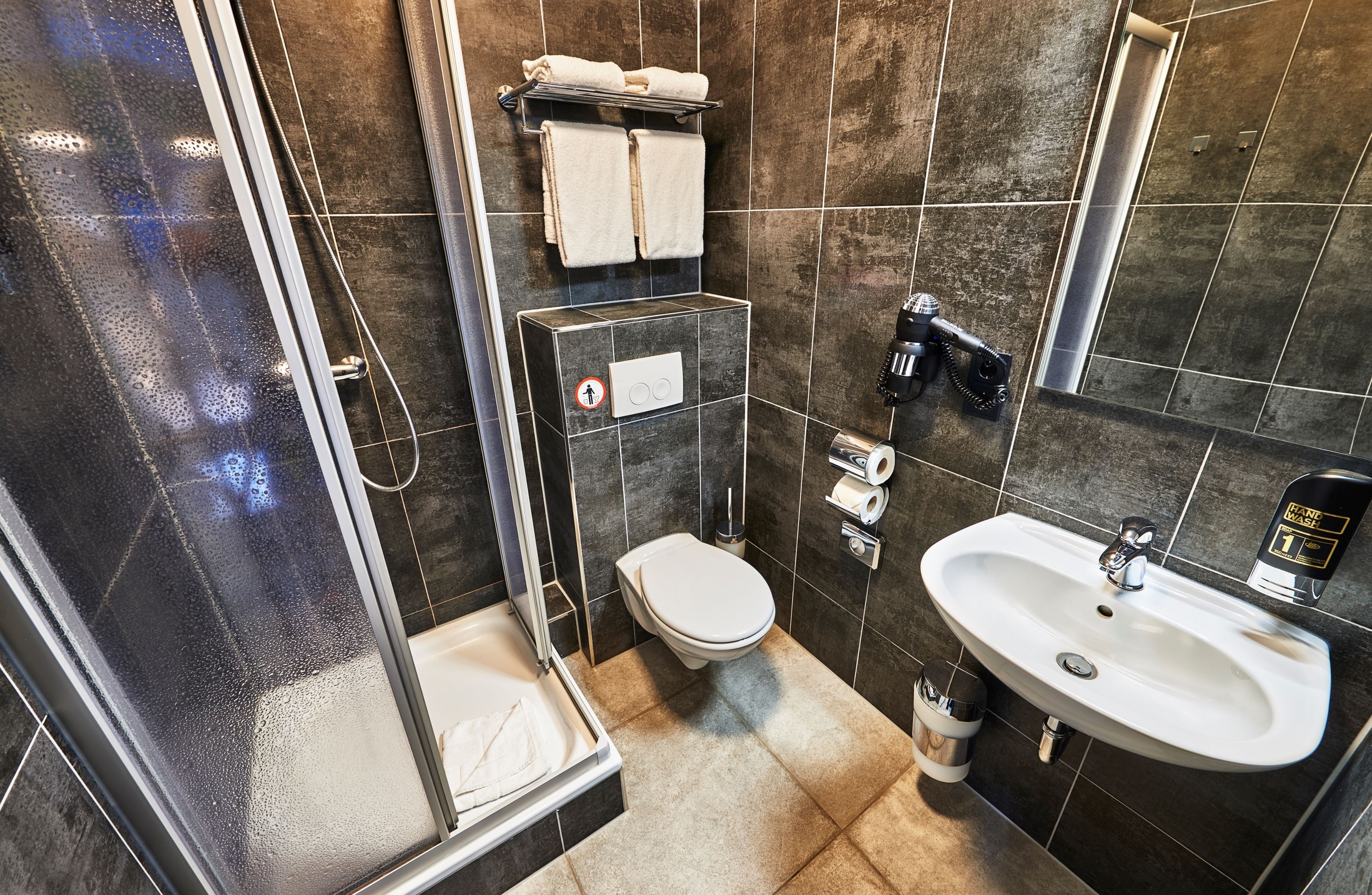 shower, free toiletries, hair dryer, towels