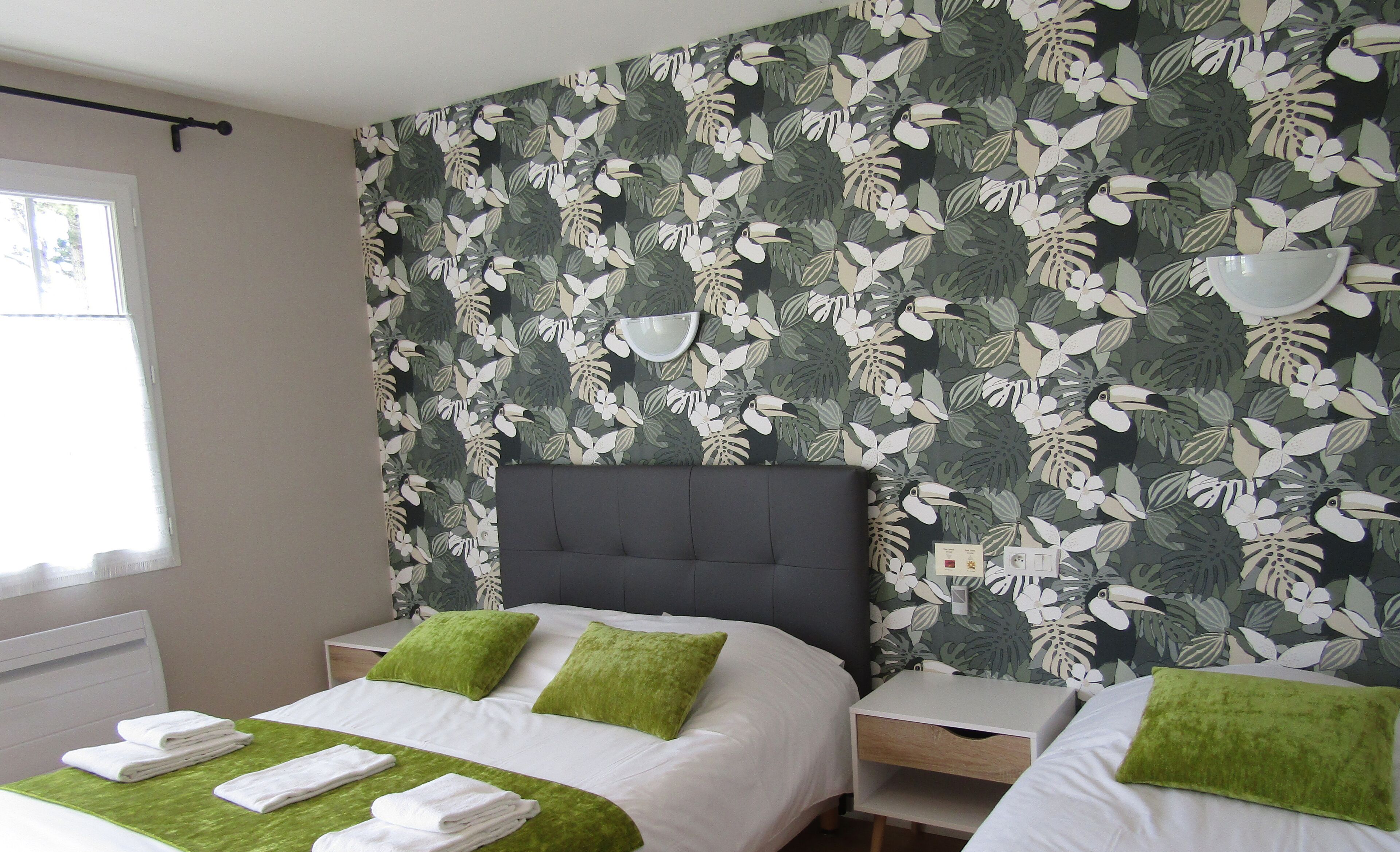 family triple room, multiple beds | premium bedding, desk, blackout curtains, iron/ironing board