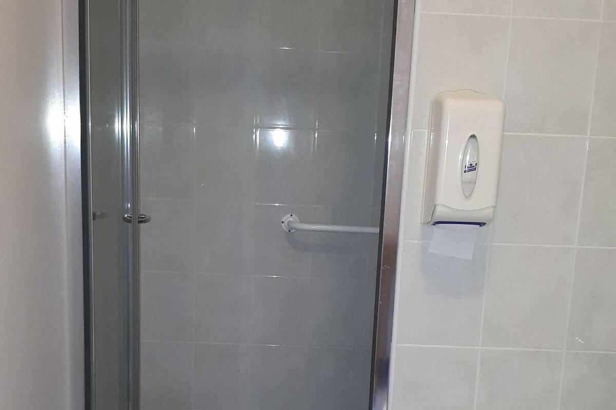 family triple room, multiple beds | bathroom | free toiletries, hair dryer, towels