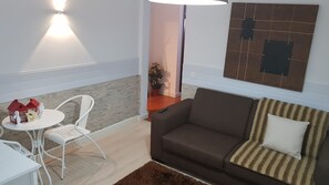 Apartment, 1 Bedroom (D) | Living area | Flat-screen TV - Azores Pedra Apartments (Ponta Delgada)