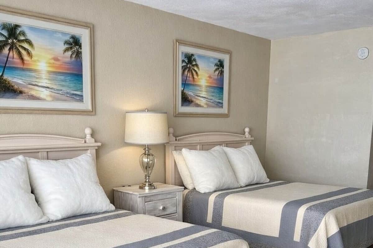 Quarto standard, 2 camas Queen, para não fumantes, banheiro privativo (2 Queen Beds Ocean View) | Ferros/tábuas de passar roupa, Wi-Fi de cortesia, roupa de cama