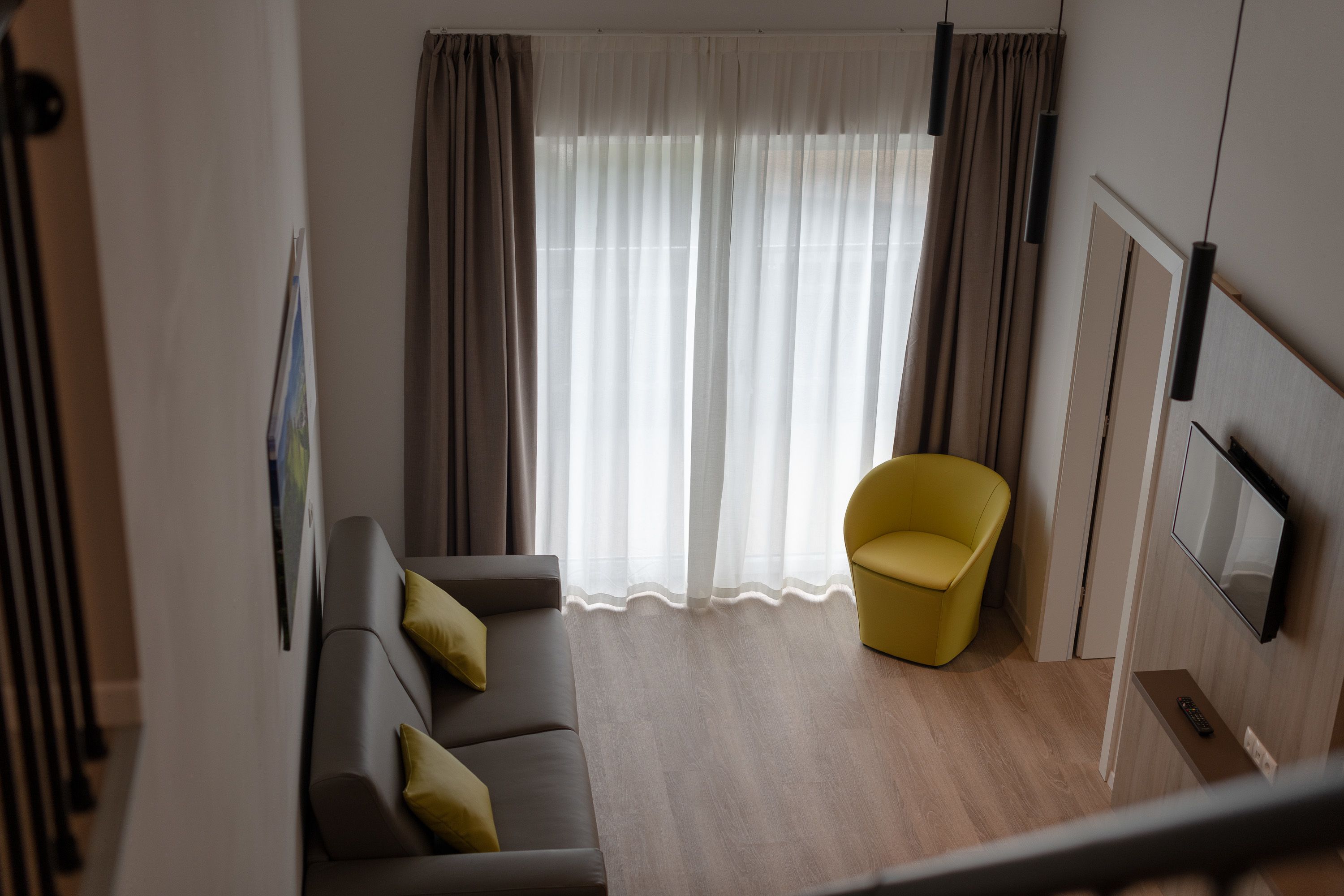 comfort duplex, 2 bedrooms | living area | flat-screen tv