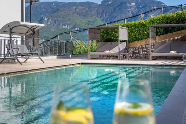 Outdoor pool, a lap pool, pool loungers