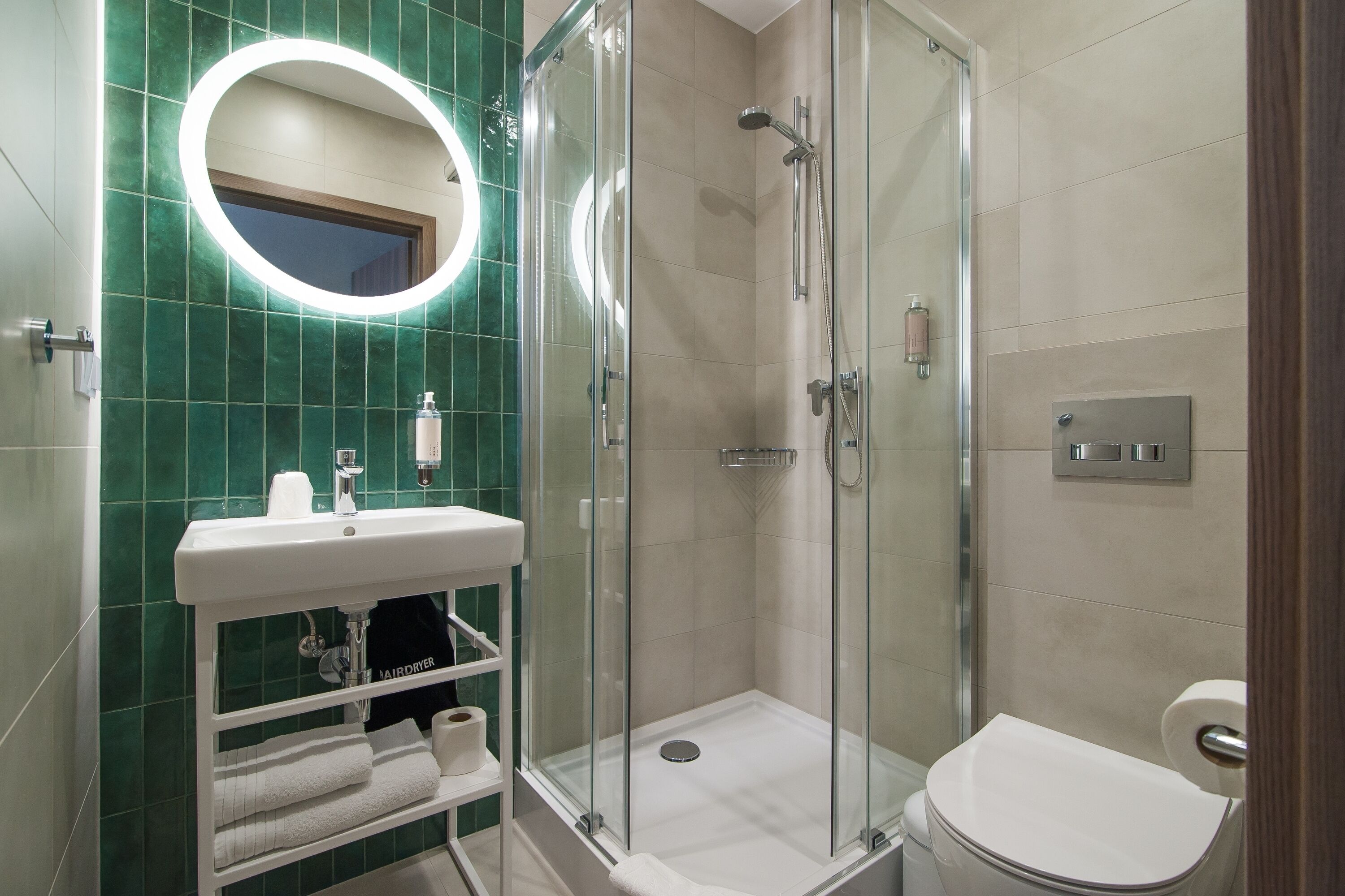Hair dryer, towels, soap, shampoo