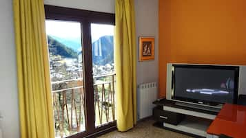 Apartment, 1 Bedroom | Living room | TV