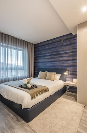 Sistema de insonorización y tabla de planchar con plancha