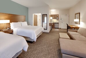A hotel room with two beds, a sitting area, a kitchenette, and a bathroom. - Staybridge Suites Oklahoma City Dwtn - Bricktown by IHG (Oklahoma City)
