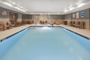 Indoor pool, open 7:00 AM to 11:00 PM, sun loungers