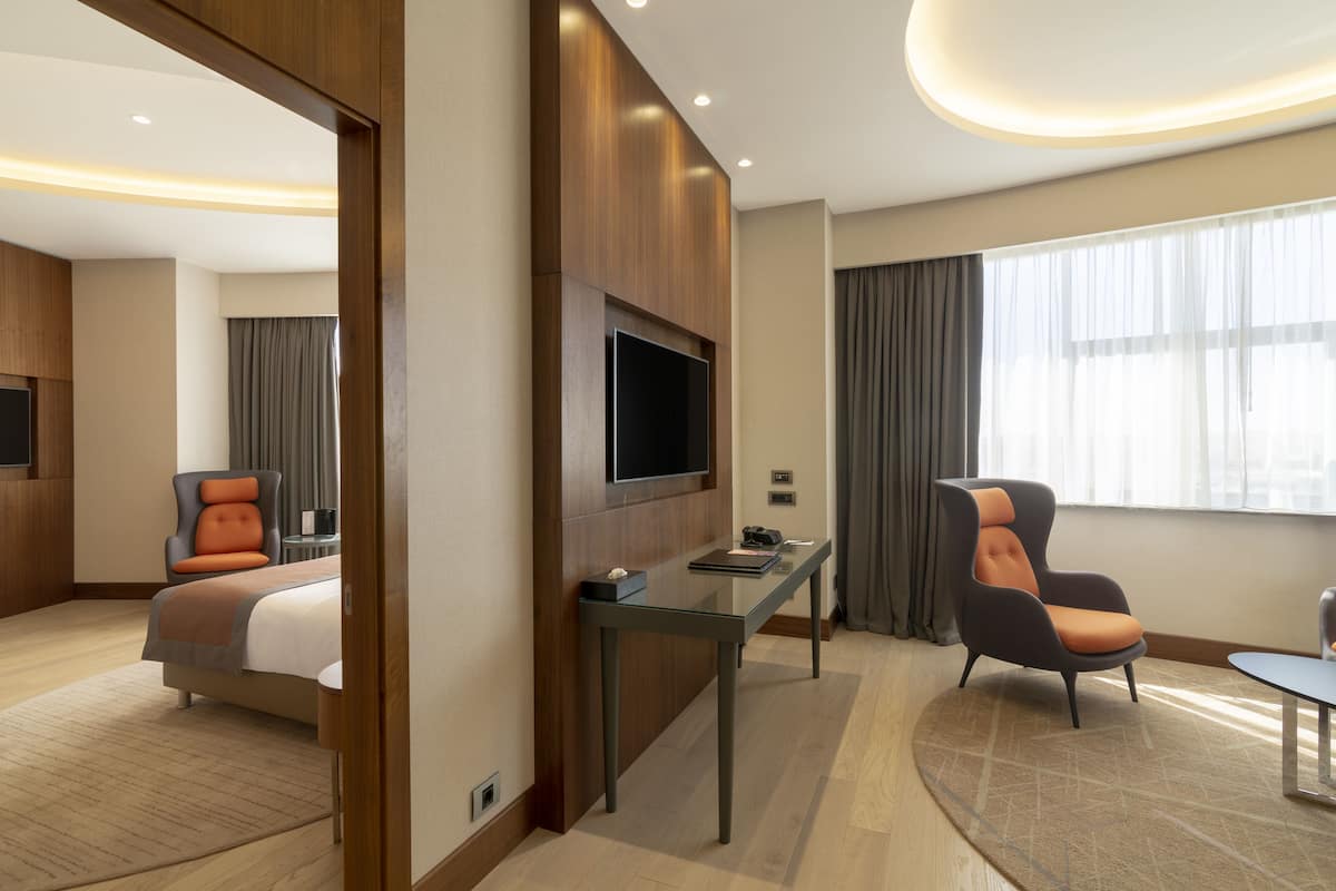 Suite, 1 Bedroom, City View | 1 bedroom, premium bedding, minibar, in-room safe