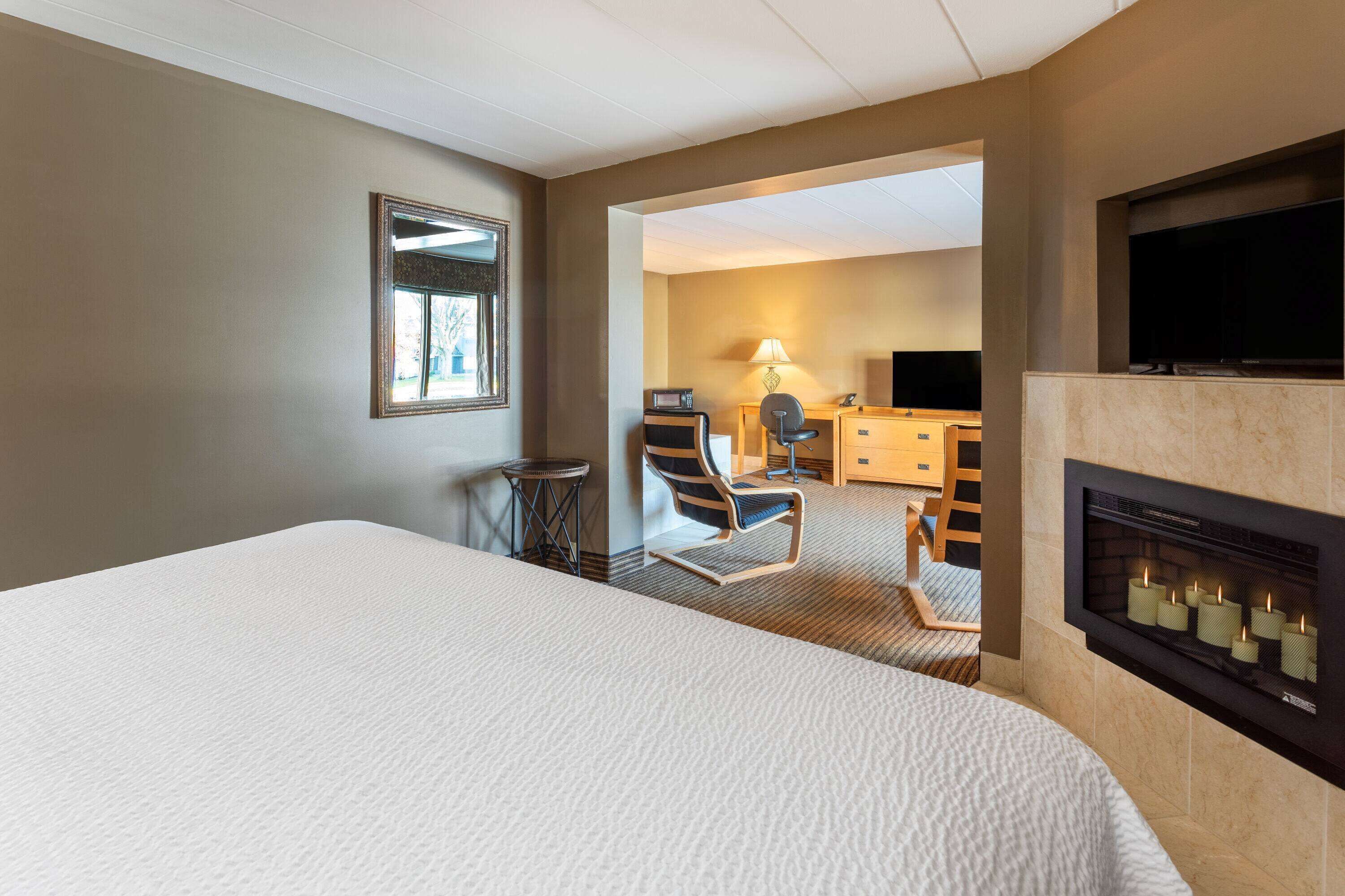 Tabla de planchar con plancha, wifi gratis y ropa de cama 