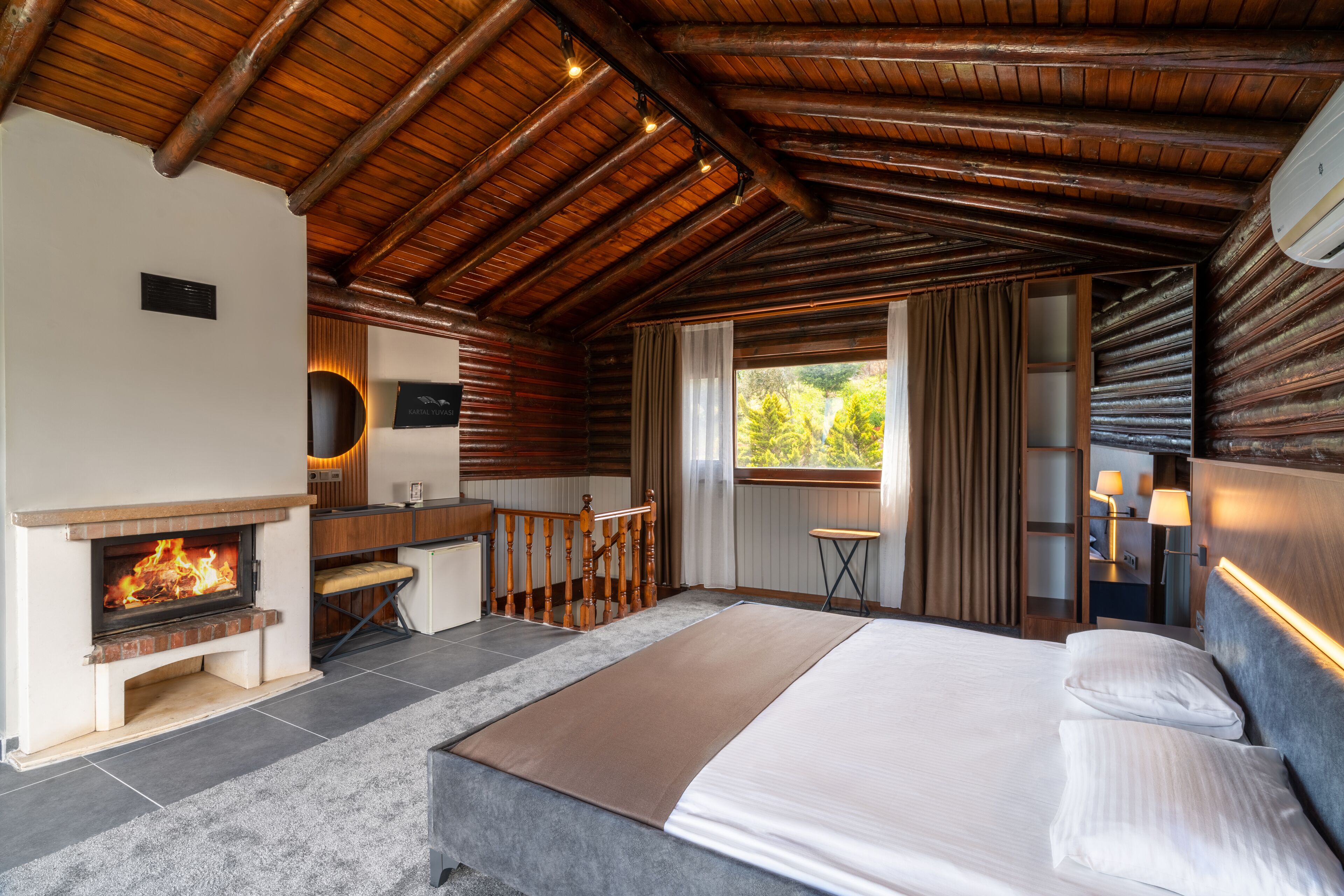 duplex room with fireplace | 2 bedrooms, premium bedding, select comfort beds, minibar