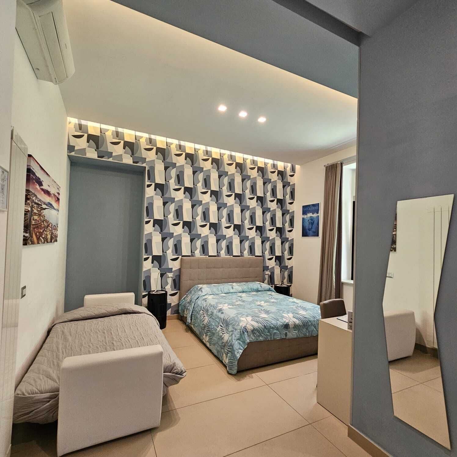 Suite monolocale Junior | Minibar, cassaforte in camera, una scrivania, tende oscuranti