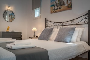 3 slaapkamers, een bureau, een strijkplank/strijkijzer