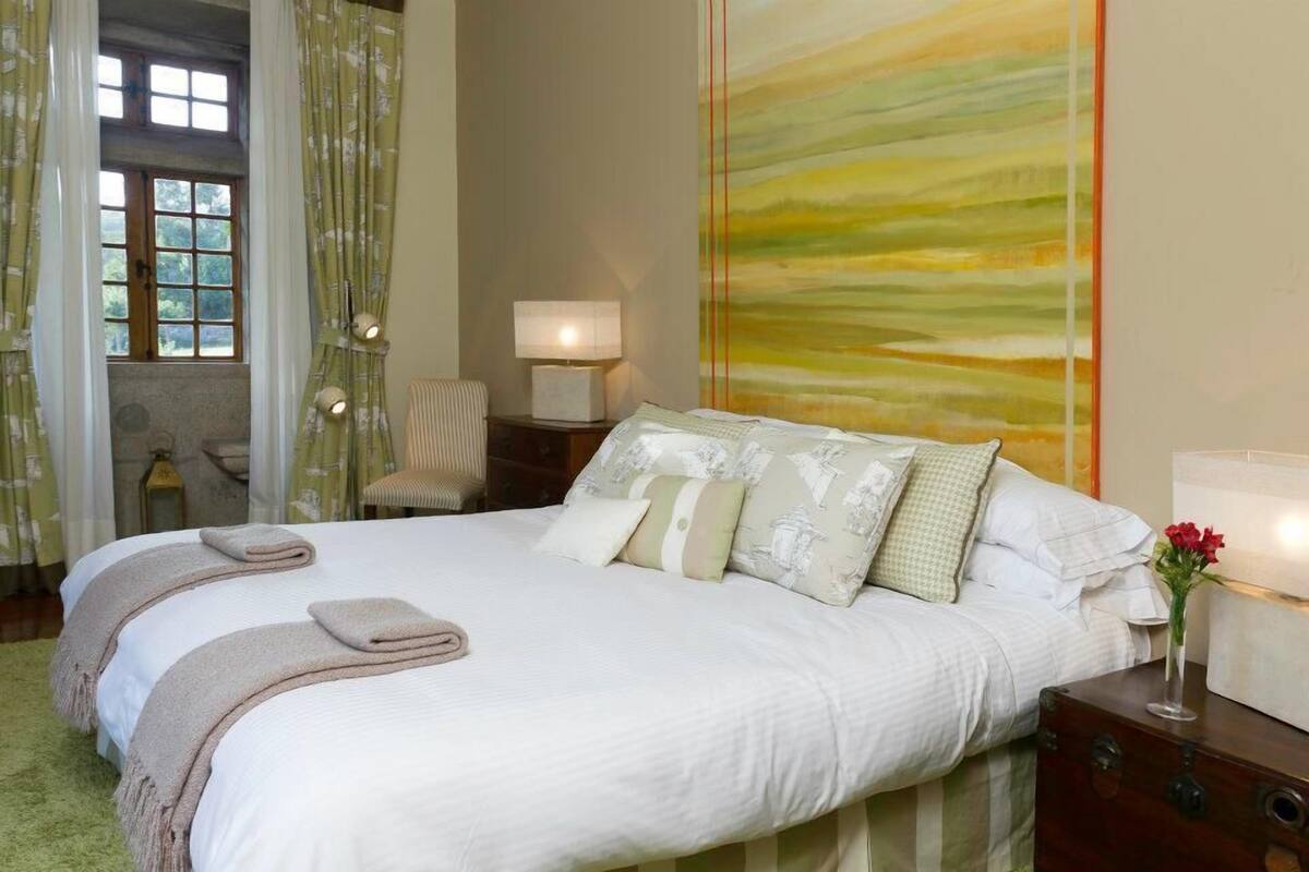 Suite, balkon, pemandangan kebun | Setrika/meja setrika dan tempat tidur bayi (biaya tambahan)
