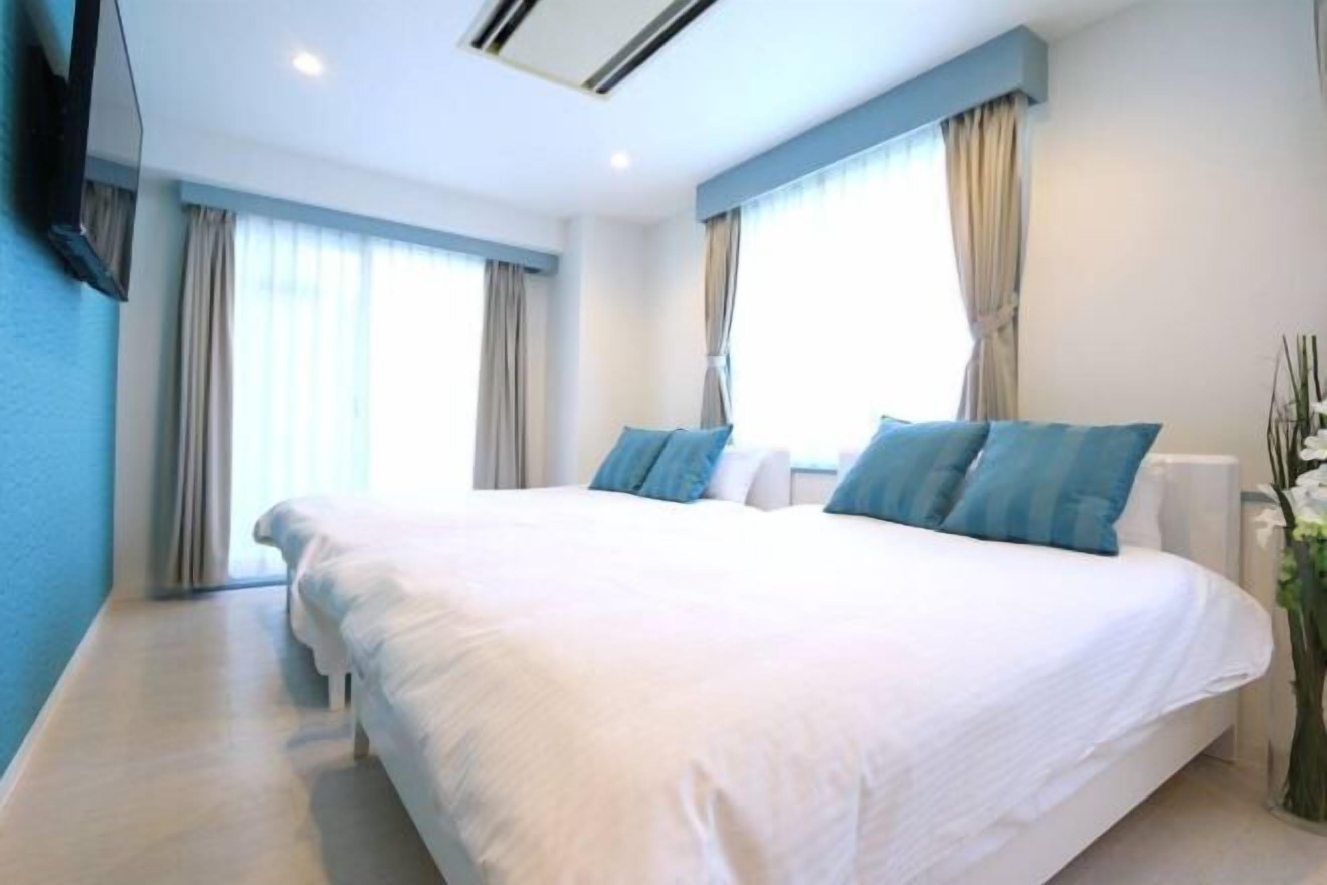 Premium bedding, blackout drapes, iron/ironing board, free WiFi