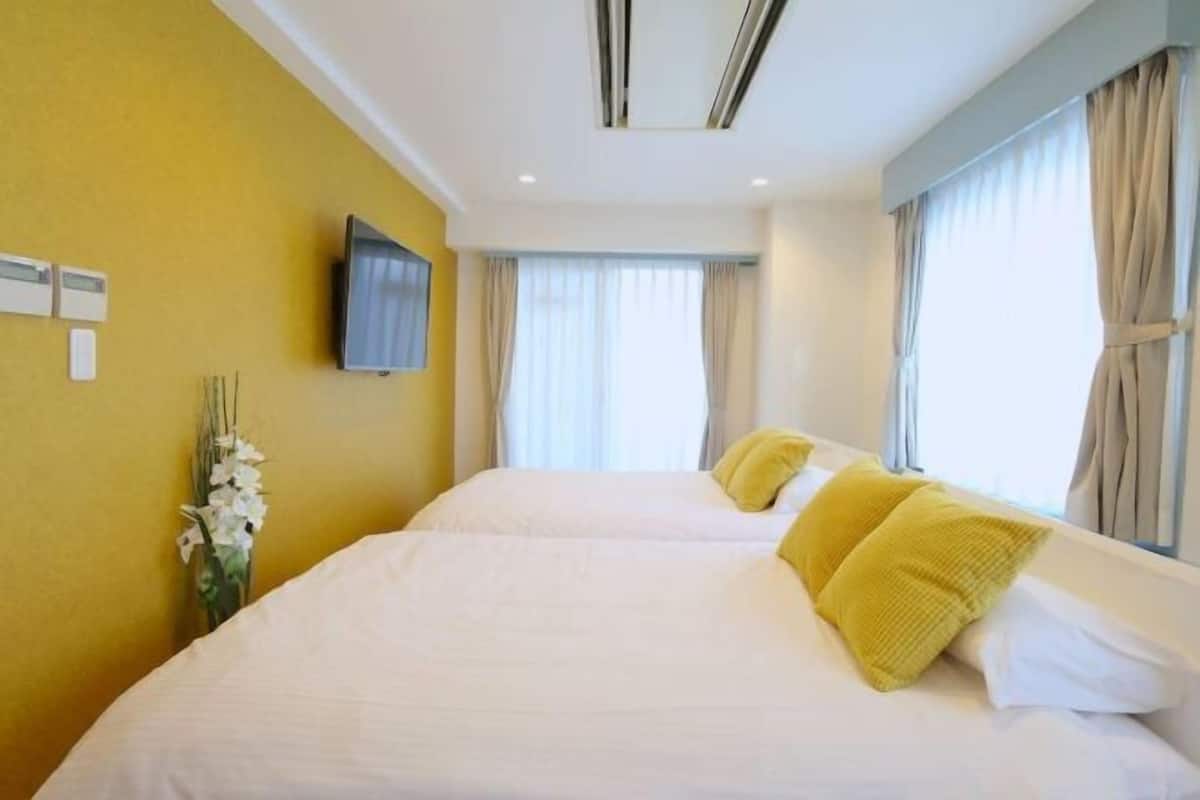 Premium bedding, blackout drapes, iron/ironing board, free WiFi