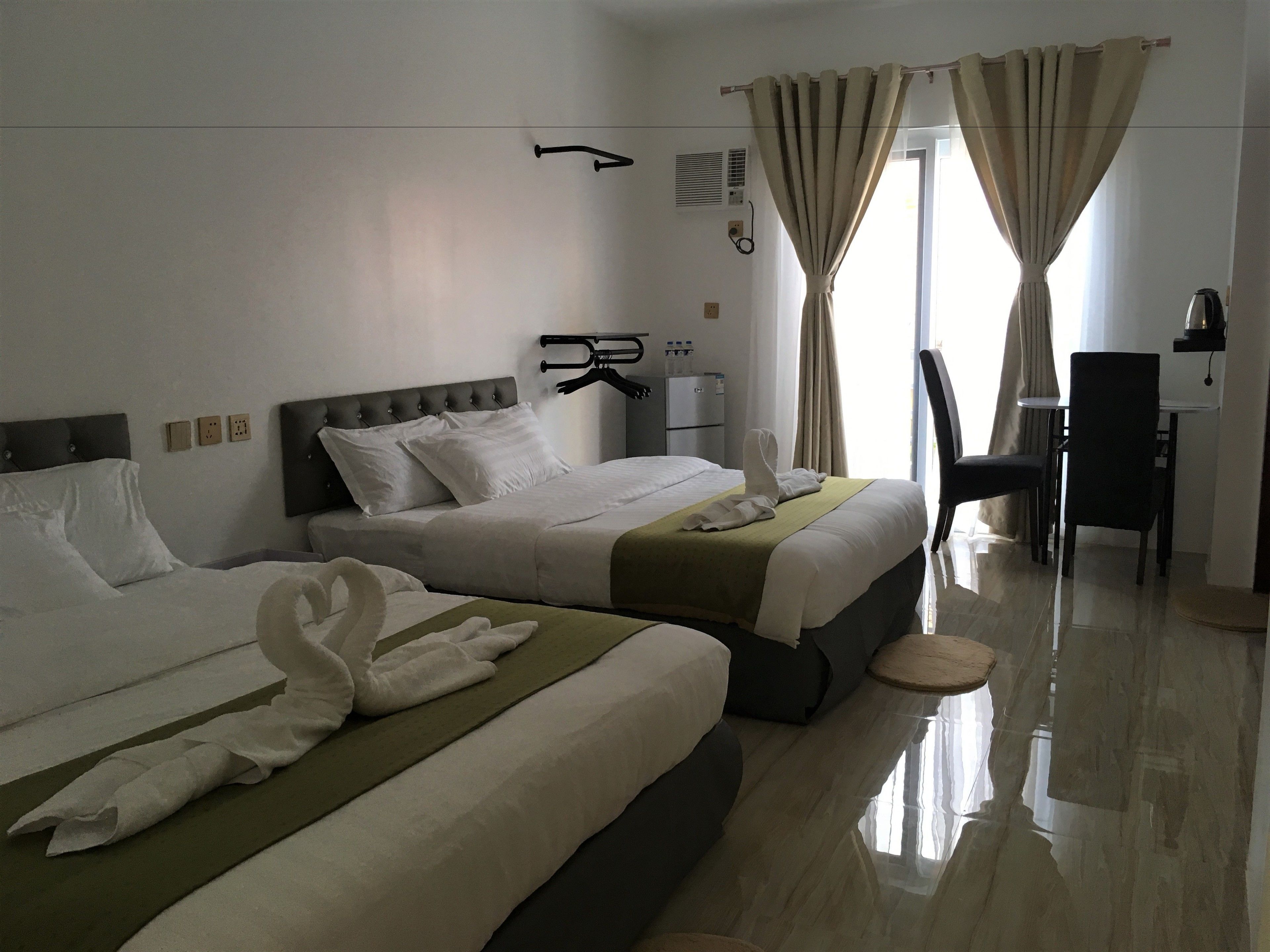 family quadruple room, 2 queen beds, ensuite | minibar, desk, cots/infant beds, free wifi