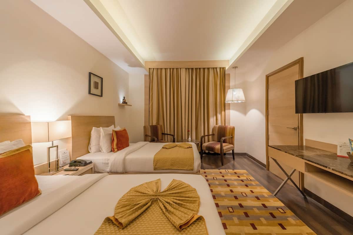 deluxe twin room | frette italian sheets, premium bedding, memory-foam beds, minibar