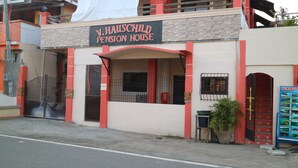 A building with a sign reading "V. Hauschild Pension House". - V.Hauschild Transient House B (Alaminos)