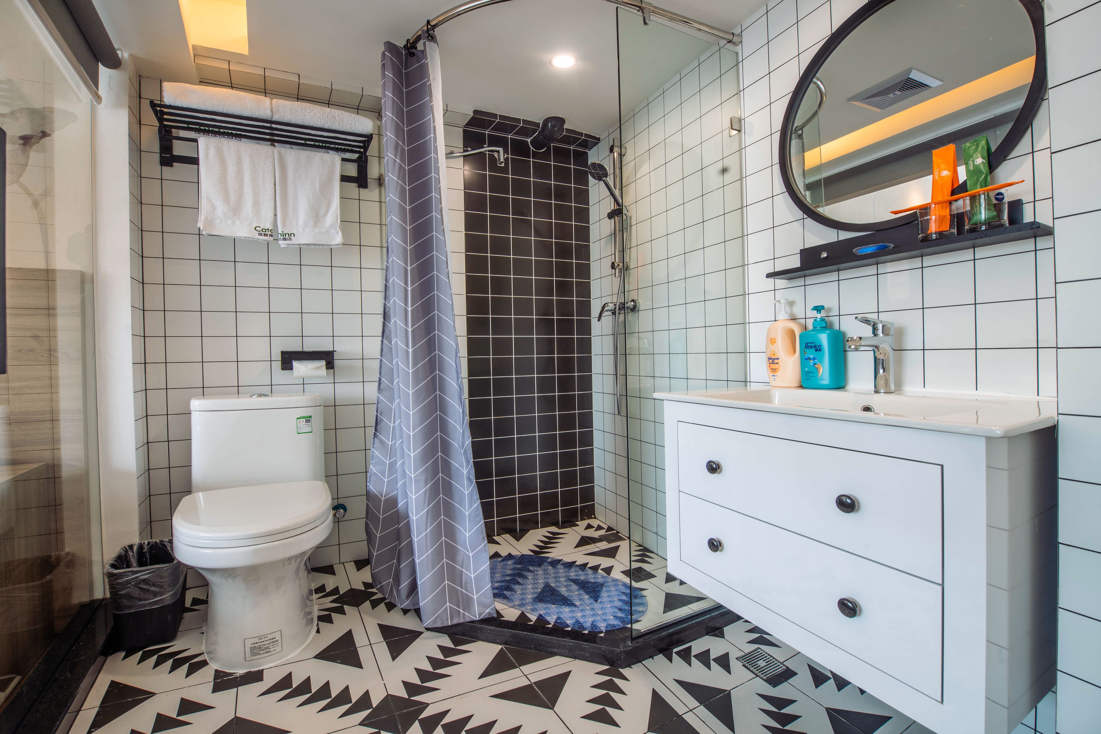 Shower, free toiletries, hair dryer, slippers