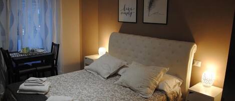 Deluxe double room (Viale Giulio Cesare 128) | Desk, iron/ironing board, free WiFi