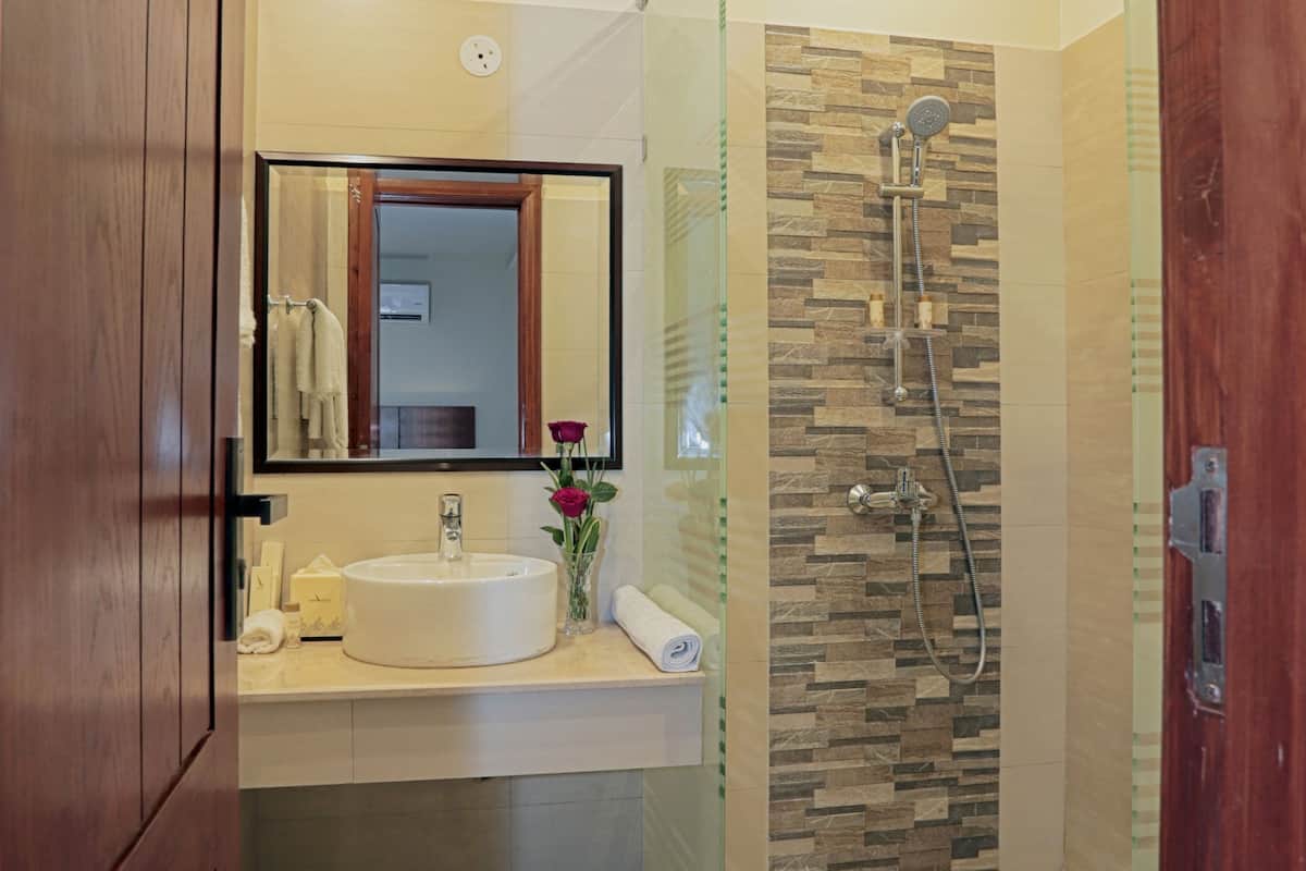 shower, free toiletries, dressing gowns, slippers