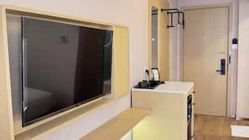 Basic Single Room (No Window) | Premium bedding, minibar, individually furnished, laptop workspace