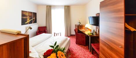 Hypoallergeen beddengoed, een bureau, een laptopwerkplek