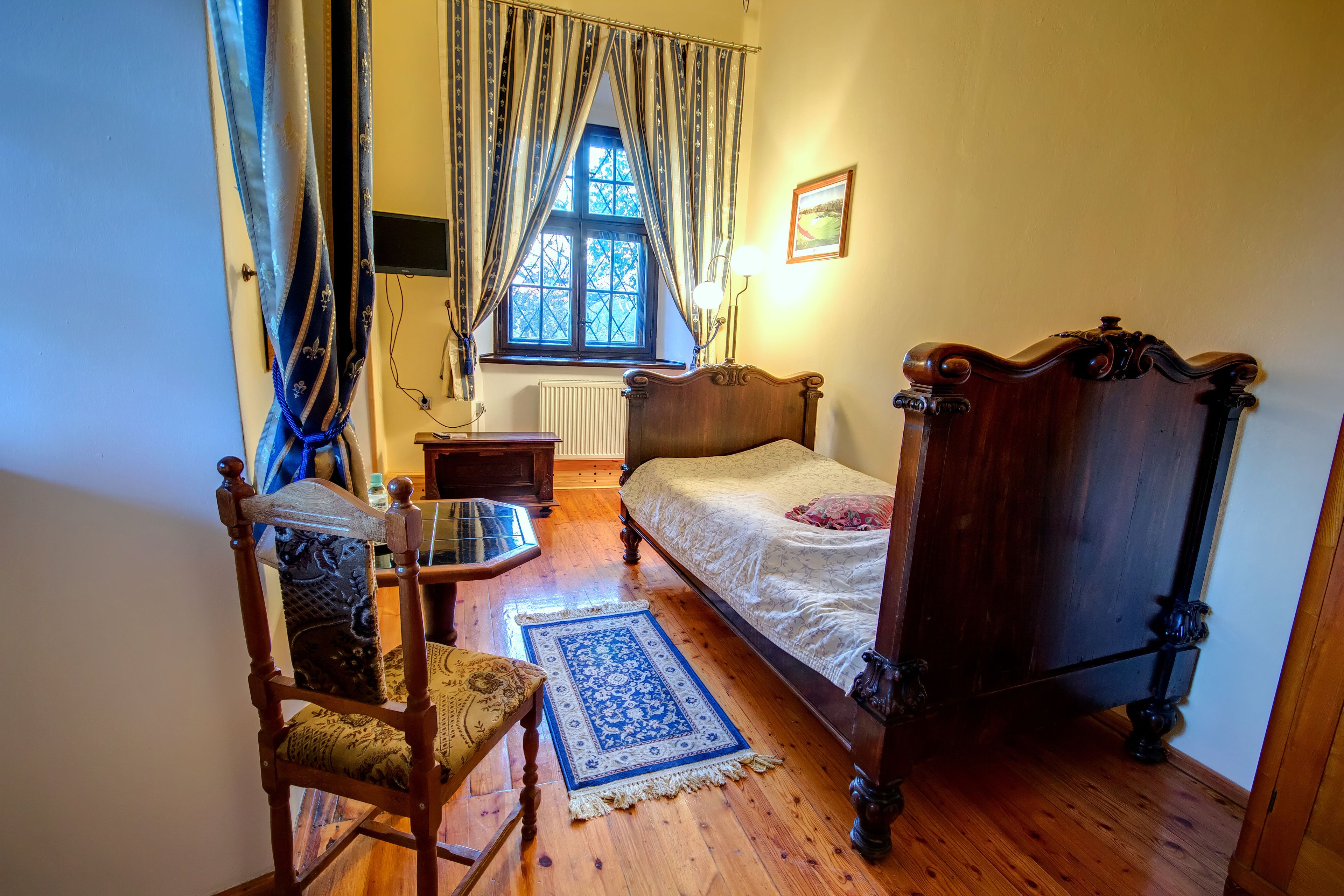 comfort single room, 1 single bed, garden view | individually decorated, individually furnished, iron/ironing board