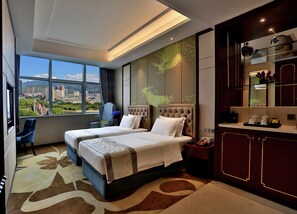 Ropa de cama de alta calidad y minibar 